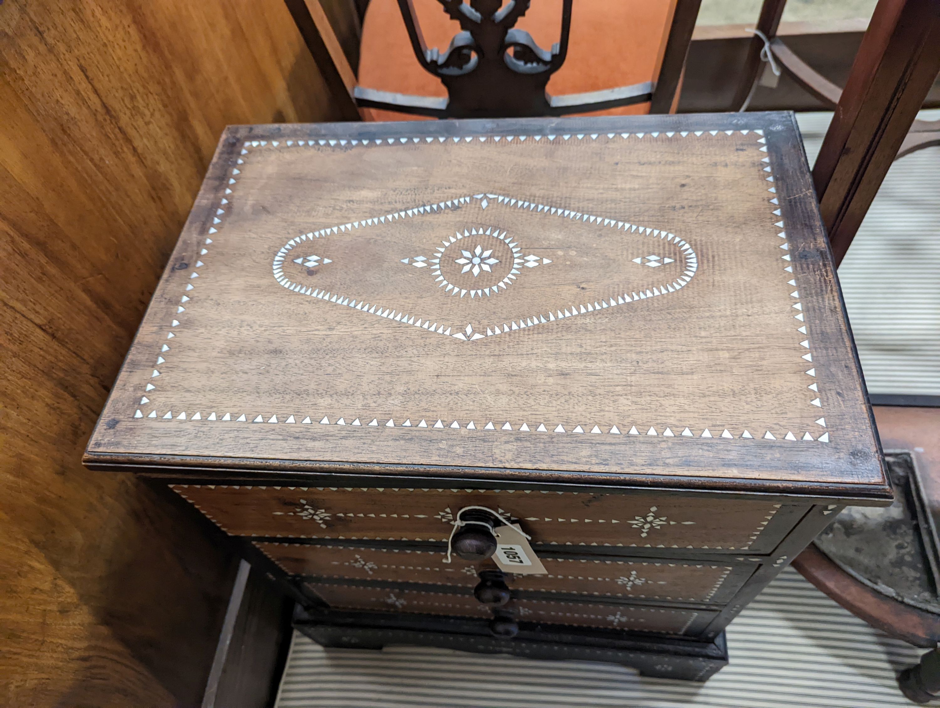 A near pair of South Asian mother of pearl inlaid three drawer small chests, larger 46cm, depth 31cm, height 54cm